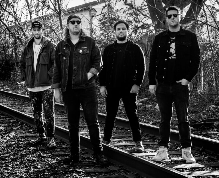 Brush Strokes & Guitar Chords: The Warhawks’ Gritty Path to Indie Rock Glory